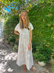 Iridescent Sea Fremantle Indulge in the art of summer with our Antibes Embroidered Cotton Dress. Made from breezy cotton, this dress is perfect for warm weather days. Embrace the season in style with its elegant vine embroidery.
