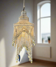 A truly exceptional piece, these chandeliers are hand made using hundreds of tiny white shells twined together on a wrought iron base. Iridescent sea Perth Fremantle