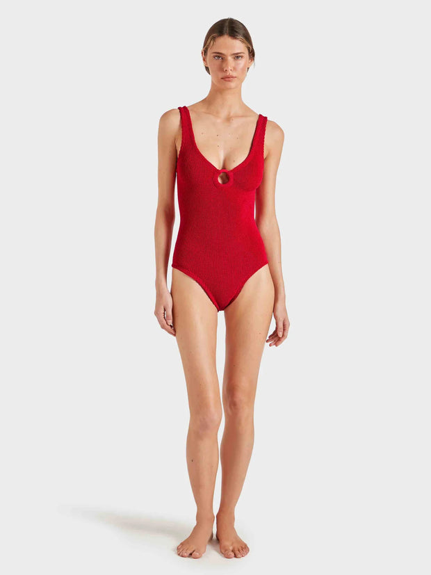 Woman wearing a red swimsuit on a white background HUNZA G Coverage Celine Swimsuit in Red iridescent Sea Fremantle