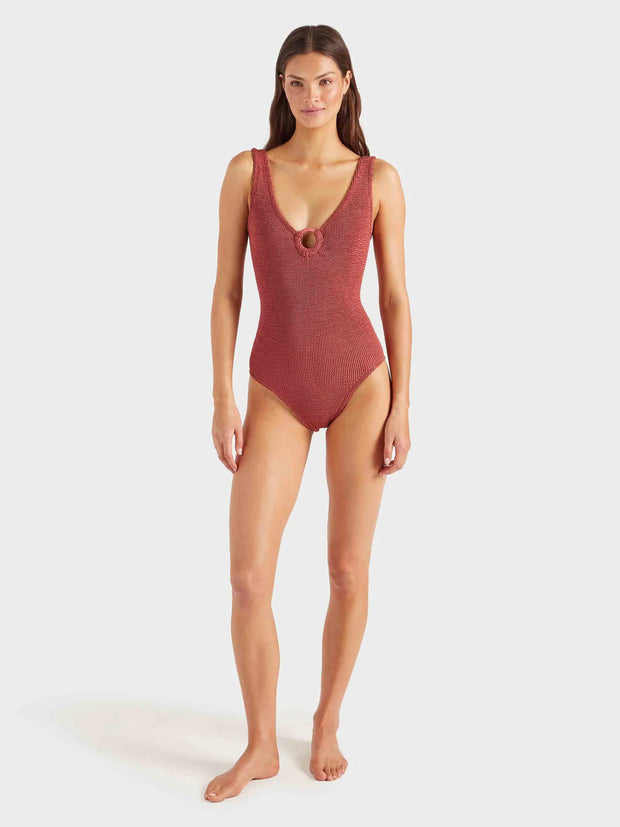 Woman wearing a pink swimsuit on a white background HUNZA G Coverage Celine Swimsuit in Rosewood Iridescent Sea Fremantle