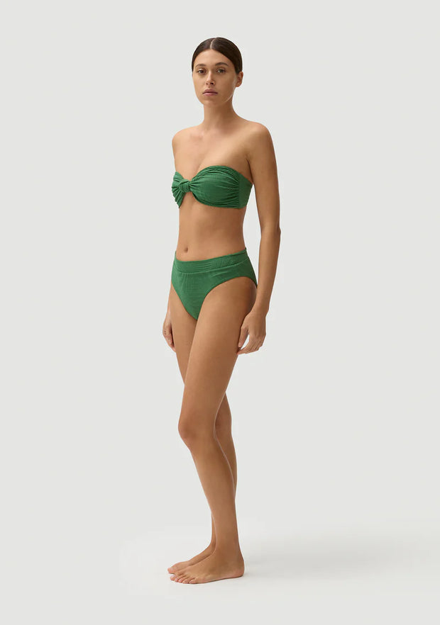 FELLA Hubert Bikini Bottom in Serpentine High-waisted 80s bottom High cut and conservative Waistline is just touching, or just below the belly button Fully lined Featuring Rio, our new art deco wave. This robust, custom fabrication sculpts and holds.