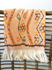 Made from hand-woven cotton, this premium beach essential showcases intricate ikat patterns, elevating your beach style to new heights. Wrap yourself in style and comfort with this must-have towel. Iridescent Sea Perth Fremantle