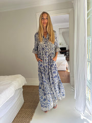 Iridescent Sea's 'Sahana' dress is cut from breezy silk-habotai patterned with striking silver and blue floral design created using traditional woodblock printing techniques. Fremantle