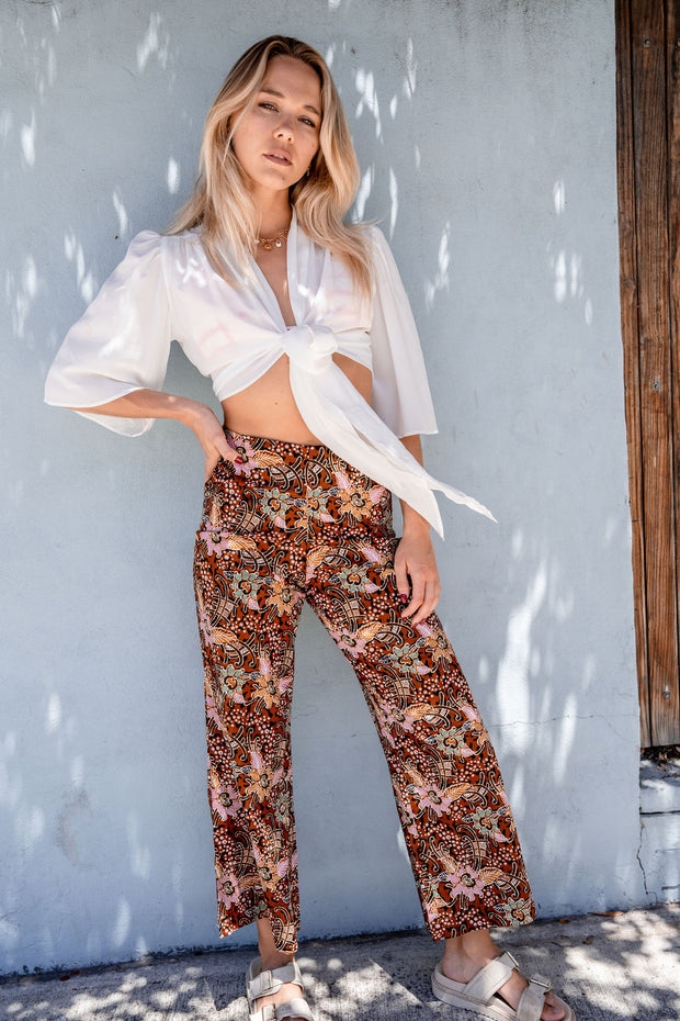 With a wide leg design and comfortable fit, these pants are perfect for any occasion Iridescent sea Batik Palazzo Pant