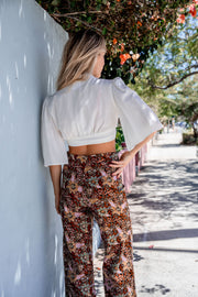 With a wide leg design and comfortable fit, these pants are perfect for any occasion Iridescent sea Batik Palazzo Pant