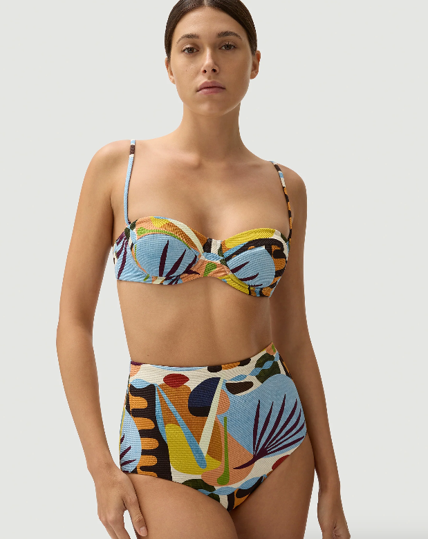 FELLA Marco Bikini Bottoms in First Date Classic high waisted bottom A flattering style that contours the hips, stomach and waistline Conservative cut Fully lined Featuring our Pique fabrication, a fine circular texture with a soft buttery feel Iridescent Sea Fremantle